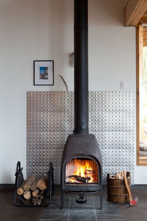 sheet metal wood stove|fireproof paneling for wood stove.